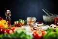 Herbs, spices and a marinade on a kitchen table Royalty Free Stock Photo