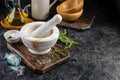 Herbs and Spices, Mortar and Pestle, Rosemary, Olive Oil and Salt Royalty Free Stock Photo