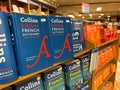 Herceg-Novi, Montenegro - 17 august 2023: Shelves with colorful French dictionaries in a bookstore