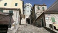 Herceg Novi, Montenegro - 31 June, 2017. Panning shot of Topla church in center of old city Herceg Novi. Adult man go