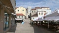 Herceg Novi, Montenegro - 31 June, 2017. Tilting shot of Topla church in center of old city Herceg Novi. Adult man go