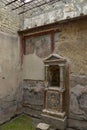 A mosaic lararium in a courtyard at the House of the Skeleton in Herculaneum, Italy, a Roman town destroyed by Mount Vesuvius in A