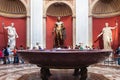 Hercules sculpture and porphyry basin in Vatican