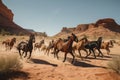 a herd of galloping horses in the desert, surrounded by red rocks Royalty Free Stock Photo