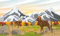 A herd of mountain sheep Ovis canadensis stands in a valley in front of mountains and autumn forest.