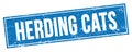 HERDING CATS text on blue grungy rectangle stamp