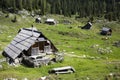 Herdsman wooden hut with solar panels, high in the mountains Royalty Free Stock Photo