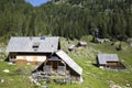 Herdsman wooden hut with solar panels, high in the mountains Royalty Free Stock Photo