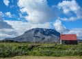 Herdubreid and volcano hut in beautiful sunny day with blue sky, Highlands of Iceland, Europe