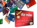 Here is an air rewards credit card with airline credit cards floating in the air.