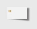 Here is a blank white credit or debit card with a golden EMV chip Royalty Free Stock Photo