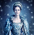 Here comes winter. Portrait of a evil-looking queen with snow falling around her. Royalty Free Stock Photo