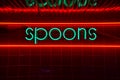Retro Neon Spoons Restaurant Sign  on Tile Royalty Free Stock Photo