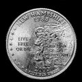 Here is a quarter representing New Hampshire.