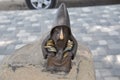 Statuette of a monk collecting money on the road in the Ukrainian Carpathians