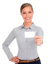Here, take my business card. Studio shot of an attractive young businesswoman holding up a blank business card.