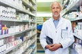 Here for you in times of healing. Portrait of a confident mature pharmacist working in a pharmacy. Royalty Free Stock Photo