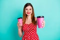 Here your latte. Portrait of positive cheerful girl buy takeout coffee cup hold give her friend wear dotted skirt