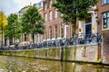 The Herengracht Gentlemen`s Canal with its large historic houses and the many parked bikes in the city center of Amsterdam