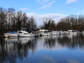 Boats moored in a marina in Herentals, Belgium. Royalty Free Stock Photo