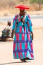 Herero woman in traditional dress and horned hat, Kaokoland wilderness region, Namibia, Africa