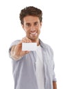Heres my card. Portrait of a handsome man holding up a business card of copyspace. Royalty Free Stock Photo