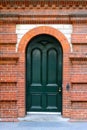 Heritage Arched Door in Red Brick Wall Royalty Free Stock Photo