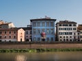 Heritage buildings in Pisa and the Arno river