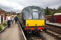 Heritage restored diesel train at railway station platform with Grosmont destination displayed. North Yorkshire Moors Railway