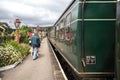 Heritage restored train carriage at railway station platform with Grosmont destination displayed. North Yorkshire Moors Railway