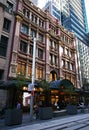 Victorian multistory retail mall of historic Strand Arcade with arched awning entry on city street in Sydney downtown, Australia Royalty Free Stock Photo