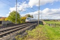 High speed train passes a railroad crossing at Herleshausen, Germany Royalty Free Stock Photo