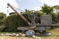 Historic crane on view to tourists near the harbour on Herm Island in the Channel Islands Royalty Free Stock Photo