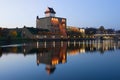 Herman Castle with reflection, October twilight. Narva, Estonia Royalty Free Stock Photo