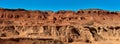 Herman Cav Canyon at sunset. South Gobi, Mongolia. Herman Tsav Canyon. Red Sandstone plateau, Martian landscape.