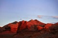 Herman Cav Canyon at sunset. South Gobi, Mongolia. Herman Tsav Canyon. Red Sandstone plateau, Martian landscape.