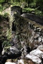 The Hermitage Bridge Perthshire Scotland with moss in artistic c Royalty Free Stock Photo