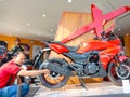 hero motorcycle sales staff displaying latest bike model into the showroom in India January 2020 Royalty Free Stock Photo