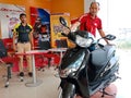 hero motorcycle sales staff displaying latest Scotty bike model into the showroom in India January 2020 Royalty Free Stock Photo