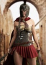 Heroic Spartan female stands ready for battle equipped with a spear and sword. Royalty Free Stock Photo