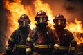Heroic team of professional firefighters on the background of a wall of fire. Generative AI illustration Royalty Free Stock Photo