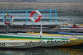 A heron standing on a ship preparing for dragon boat competition