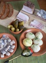 Herring, bread, pickles and bacon on a green napkin Royalty Free Stock Photo
