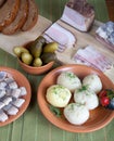 Herring, bread, pickles, potato and bacon on a green napkin Royalty Free Stock Photo