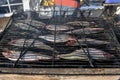 Herring on a grill on the market