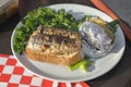 Herring grilled and baked in foil potatoes Royalty Free Stock Photo