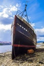 The wreck of a fishing trawler at Corpach near Fort William in the Highlands of Scotland