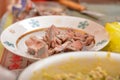 Herring on a plate is cut into small pieces for cooking fish salad for a festive dinner Royalty Free Stock Photo