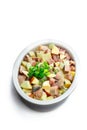 Herring salad with apple and potato isolated on white Royalty Free Stock Photo