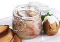 Herring salt fillet in the glass jar Royalty Free Stock Photo
